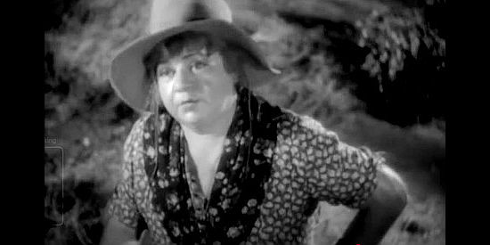May Boley as Jane, driving a wagon load of women West and giving Felice pointers on how to deal with a man in Fighting Caravans (1931)