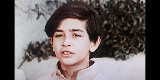 Michael Davis as Miguelito, the young boy who's a friend of Marty Robbins in Ballad of a Gunfighter (1964)