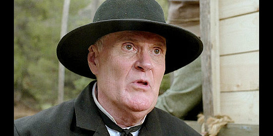 Michael Ensign as the preacher who arranged for 17 mail order brides to come West in Prairie Fever (2008)