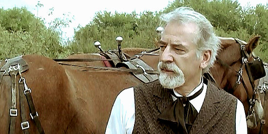 Michael Gregory as Judge Haarrold, the jude who gets involved in a plan to steal gold in Return of the Outlaws (2009)
