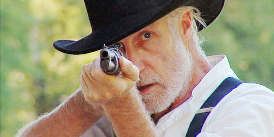 Michael Hankin as Gunter, going against his own pledge not to kill in Six Gun (2008)