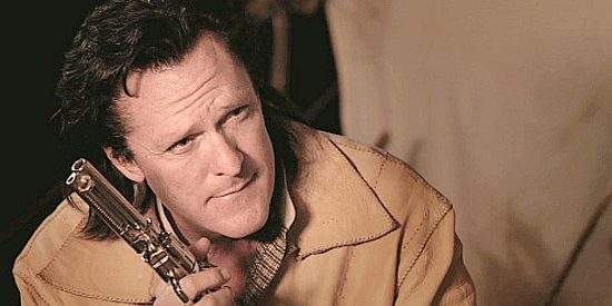 Michael Madsen as Sheriff Sawyer, telling tales about Father Bill in A Sierra Nevada Gunfight (2013)