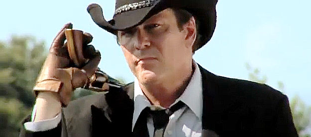 Michael Madsen as U.S. Marshal Stallings, a lawman in cahoots with Scarsdale in A Cold Day in Hell (2011)