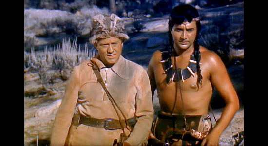 Michael O'Shea as Hawk-eye and Rick Vallin as Uncas, trying to guide two women and a young boy to the safety of a fort in Last of the Redmen (1947)