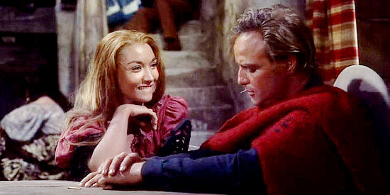 Miriam Colon as Red getting reacquainted with Rio (Marlon Brandon) after his five-year absence in One-Eyed Jacks (1963)