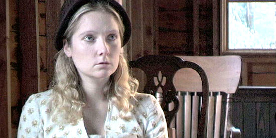 Molly Kasch as Lizzy Hearting, listening to another of her father's rants from the pulpit in Gunfight at Yuma (2012)