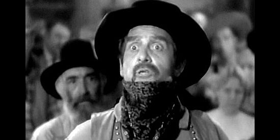 Moroni Olsen as Missouri, less than thrill at the thought of going to jail for what was supposed to be a phony holdup in Yellow Dust (1936)