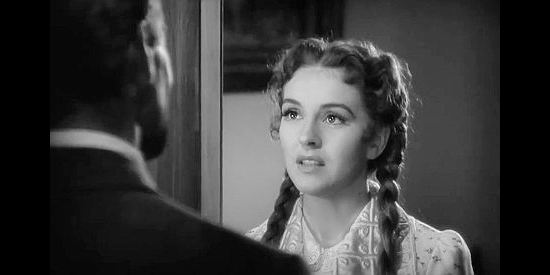 Nancy Kelly as Sarah Allen, Doc's gal from back East, being urged to stay in Tombstone by Wyatt Earp in Frontier Marshal (1939)