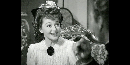 Olivia de Havilland as Elizabeth Bacon, being courted by Custer in They Died with Their Boots On (1941)