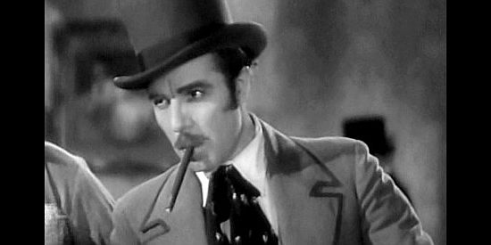Onslow Stevens as Jack Hanley, awaiting the arrival of his new lady singer in Yellow Dust (1936)