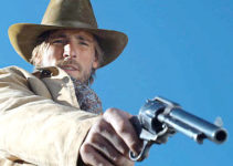 Andrew W. Walker as Cole Brandt, dispensing justice with his six-gun in The Gundown (2011)