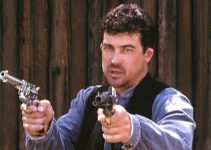 Jason Rodriguez as Luke, preparing to face down three of Bonham's men in Reckoning (2002)