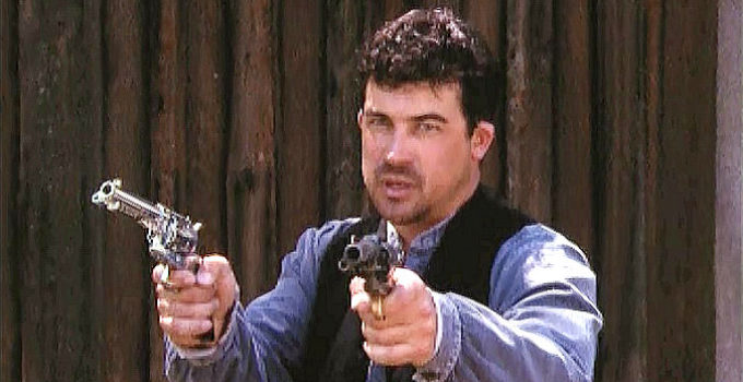 Jason Rodriguez as Luke, preparing to face down three of Bonham's men in Reckoning (2002)