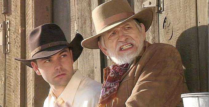 Justin Kreinbrink as John Cooper and William Killian as Sheriff Hinkle in The Decoy (2006)