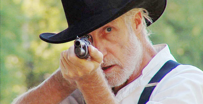 Michael Hankin as Gunter, one of Tommy Hill's friends, in Six Gun (2008)
