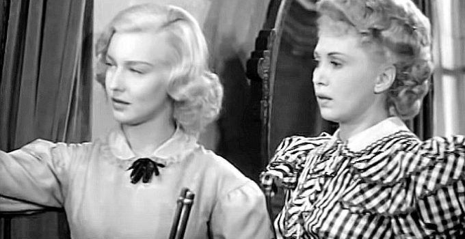 Ann Savage as Jean Shelby with Claudia Drake as Mary Manson in Renegade Girl (1946)