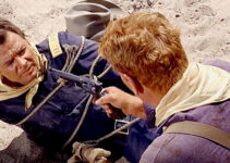 Audie Murphy as Capt. Coburn, under the gun of one of his own men in 40 Guns to Apache Pass (1967)