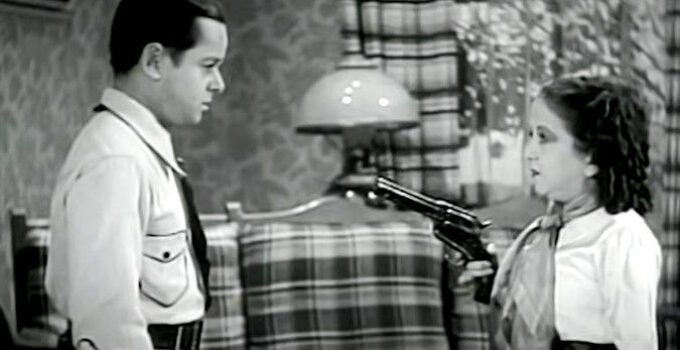 Billy Curtis as Buck Lawson and Yvonne Moray as Nancy Preston, at odds becaucse of their feuding families in The Terror of Tiny Town (1938)