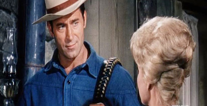 Clint Walker as Big Jim Cole ready to swap his old badge and six-gun for a loan for his ranch in The Night of the Grizzly (1966)