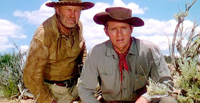 Edgar Buchanan as Jonah Johnson and Howard Duff as Lin Sloane, tracking a herd of wild horses in Red Canyon (1949)