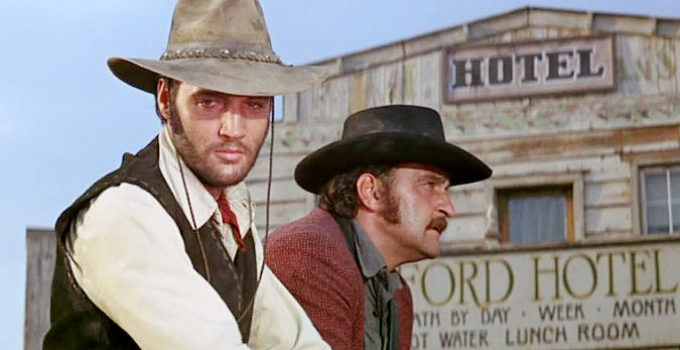 Elvis Presley as Jess Wade and Victor French as Vince Hackett in Charro! (1969)