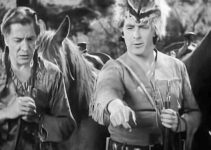George Regas as Black Eagle and George O'Brien as Daniel Boone, scouting for Indian trouble in Daniel Boone (1936)