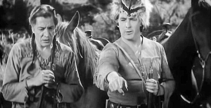 George Regas as Black Eagle and George O'Brien as Daniel Boone, scouting for Indian trouble in Daniel Boone (1936)