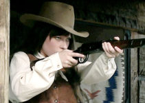 Hannah Hague as Eryn Cates, spotting trouble riding her way in Hell's Fury (2009)