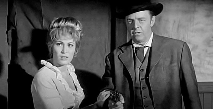 Jodi Mitchell as Sally Lattimore, trying to prevent Ben (Harry Lauter) from carrying out his planned vengeance in Convict Stage (1965)