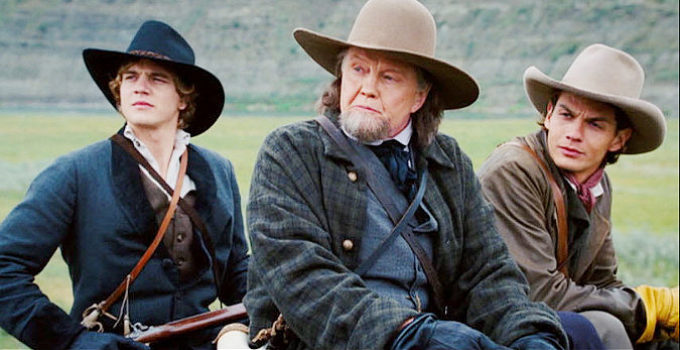 Jon Voight as Jacob Samuelson with his sons Micah (Taylor Handley) and Jonathan (Trent Ford) in September Dawn (2006)