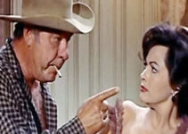 Lon Chaney Jr. as Tiny and Yvonne De Carlo as Ellie Irish in Law of the Lawless (1964)