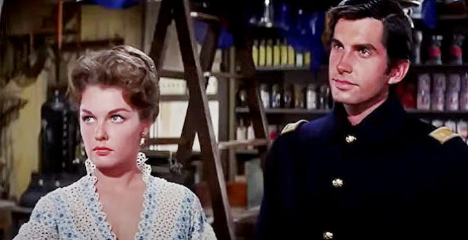 Luana Patten as Tracey Hamilton and George Hamilton as Lt. McQuade in A Thunder of Drums (1961)