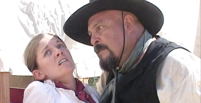 Mike Moroff as Dutch Henry threatening captive Olivia Noland (Megan McNally) in Three Bad Men (2005)
