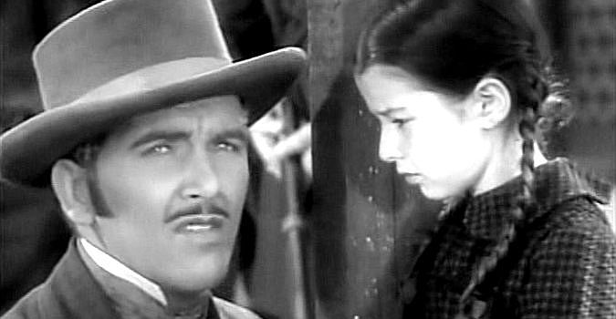 Preston Foster as John Oakhurst and Virginia Weidler as Luck, bidding farewell in The Outcasts of Poker Flat (1937)