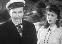 Preston Foster as Paxton Bryce, dreaming of a cattle empire as Abby (Frances Gifford)) looks on in American Empire (1942)