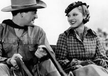 Richard Dix as Bob Culpepper and Leila Hyams as Nellie Brian getting acquainted on a stage ride to town in Yellow Dust (1936)