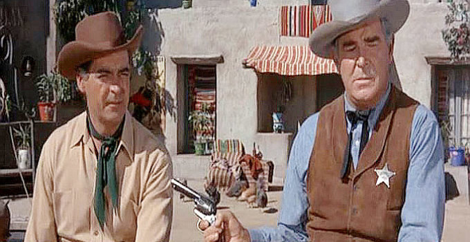 Rod Cameron as Sheriff Ben Corey, trying to take Blaine Madden (Rory Calhoun) into custody in Sanctuary in The Gun Hawk (1963)