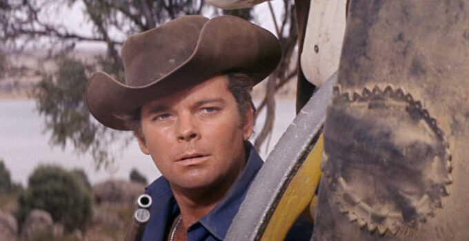 Russ Tamblyn as Johnny Ketchum, helping foil a stagecoach holdup attempt in Son of a Gunfighter (1965)