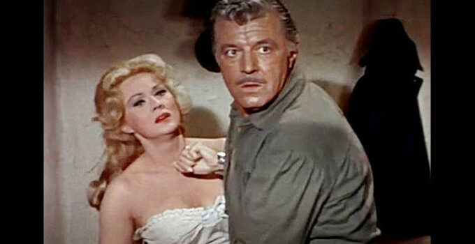 Virginia Mayo as Linda Lee, locked in a struggle with Bo Greer (James Craig) in Fort Utah (1967)