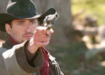 Wes Brown as Wes Rawlings, taking matters into his very capable gunhand in Shadow on the Mesa (2013)