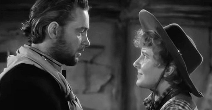 William Holden as Peter Muncie and Jean Arthur as Phoebe Titus, together again in Arizona (1940)