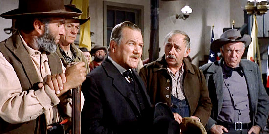Paul Birch (middle) as Edward Purcell, Marty's dad, wondering about the rescued young man in Two Rode Together (1961)