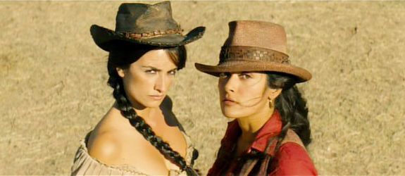Penelope Cruz as Maria Alvarez and Salma Hayek as Sara Sandoval in Bandidas (2006)