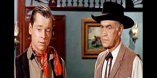 Peter Duryea as Rusty Bob Blazer with the sheriff (Stuart Randall), talking to Blazer's seriously wounded father in Taggart (1964)