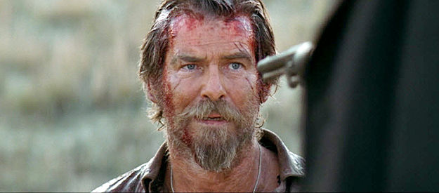 Pierce Brosnan as Gideon, the pursuit having come to an end in Seraphim Falls (2006)