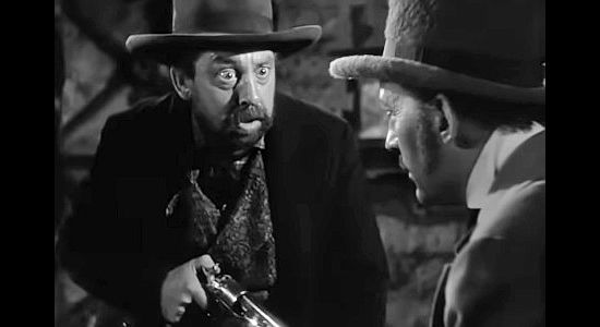 Porter Hall as Lazarus Ward, the freightner who uses his monopoly to cheat Tucson residents in Arizona (1940)