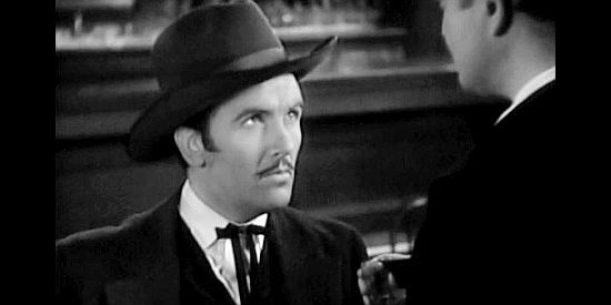 Preston Fosterr as Tex Randolph, the gunman who befriends the man he was supposed to kill in The Arizonian (1935)