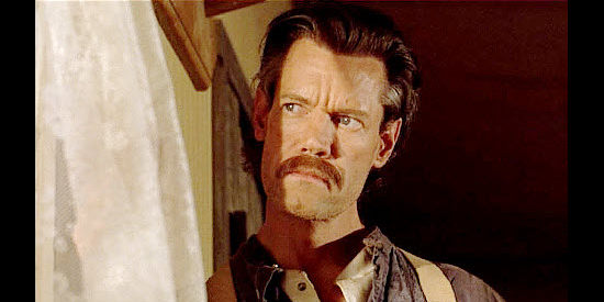 Randy Travis as Jack Cole, aka Fowler, on the watch for trouble in The Long Ride Home (2003)