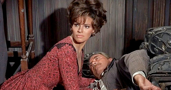 Raquel Welch as Maria Stoner with her fatally wounded husband in Bandolero! (1969)