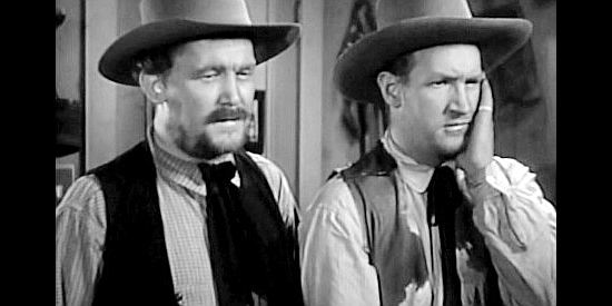 Ray Mayer as Frank McCloskey and Joe Sawyer as Keeler, two of Mannon's gunmen in The Arizonian (1935)